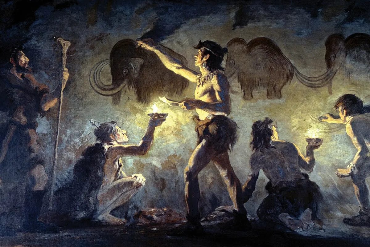 Cro-Magnon artists painting woolly mammoths in Font-de-Gaume, AMNH.
